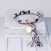 Load image into Gallery viewer, Halo Tassel Bracelet Key Chain
